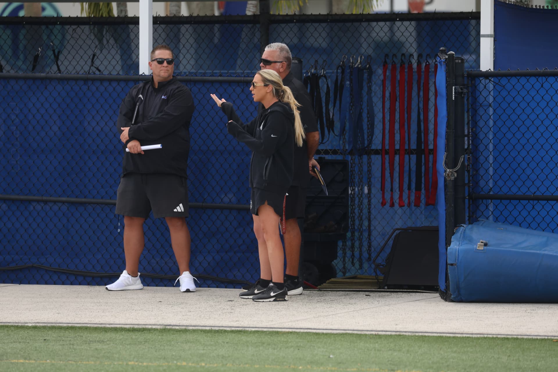 Coaches and directors watching from the sideline
