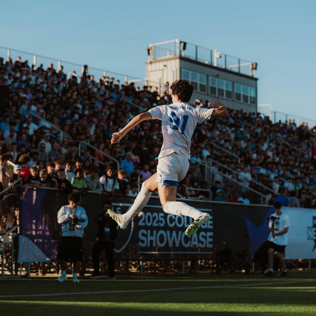 Player celebrating in front of a packed showcase crowd